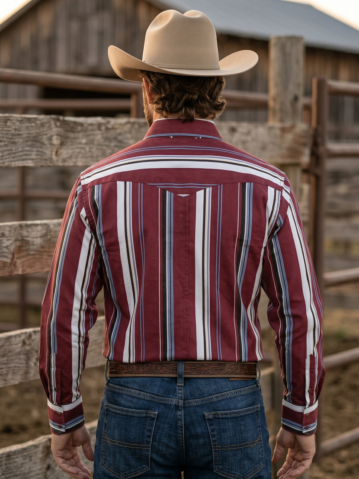 Rear view of man wearing Pecos Western burgundy vertical striped Western shirt showing horizontal striped back yoke
