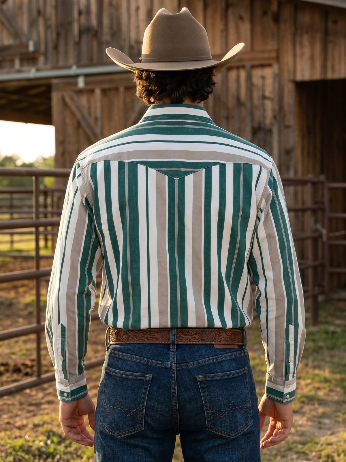 Rear view of men's forest green striped Western shirt showing horizontal shoulder stripes and pointed back yoke