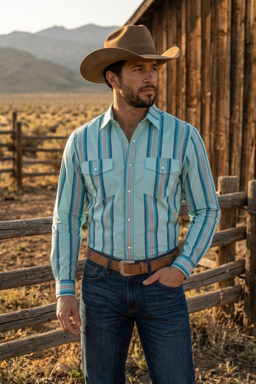 Front view of men's turquoise multi-stripe pearl snap western shirt showing single-point front yokes and chest flap pockets.